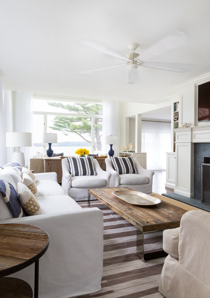 This is an example of a large beach style living room in New York.