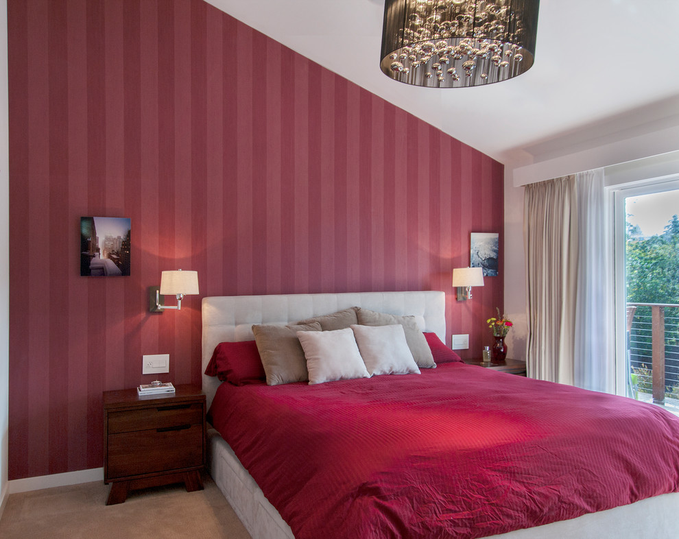 Small contemporary master bedroom in San Francisco with red walls, carpet and beige floor.