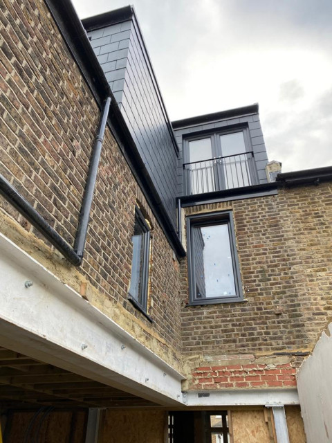 Loft conversion contemporaneo-cocina