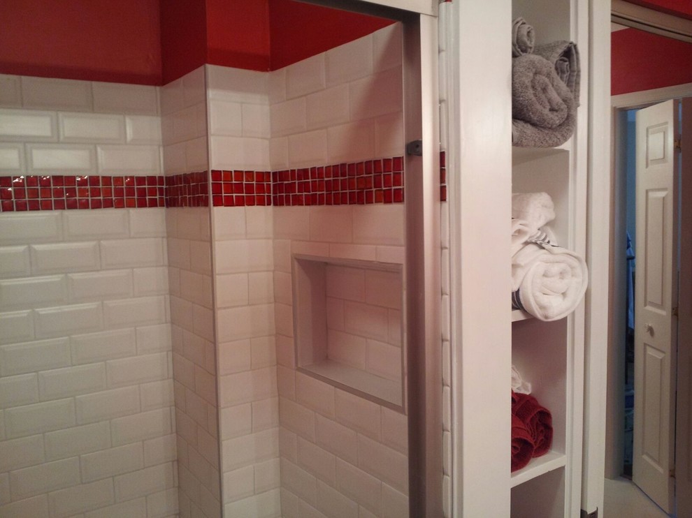 This is an example of a mid-sized traditional master bathroom in Richmond with a drop-in sink, flat-panel cabinets, white cabinets, granite benchtops, an alcove shower, a two-piece toilet, white tile, red walls, ceramic floors and mosaic tile.