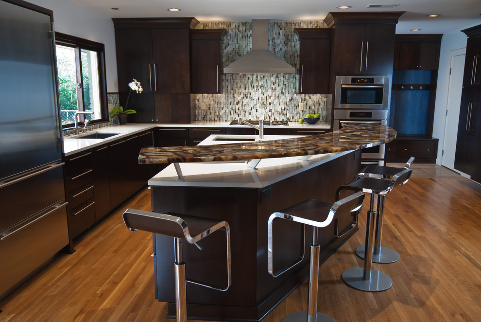 Photo of a contemporary kitchen in Other with stainless steel appliances.