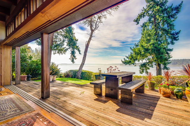 Rustic Waterfront Tranquility rustic-terrace