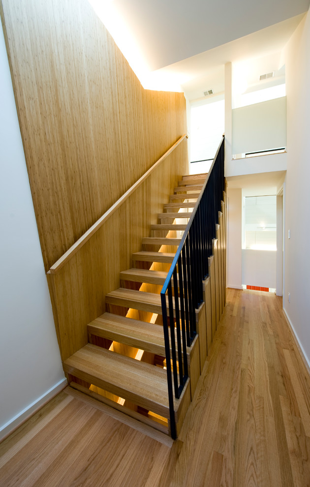 Mid-sized modern wood floating staircase in DC Metro with open risers.