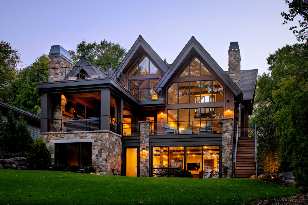 Inspiration for a contemporary three-story gable roof remodel in Minneapolis with a shingle roof and a gray roof