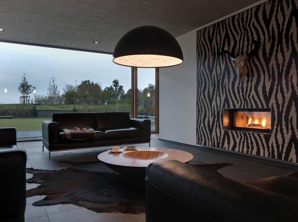 Photo of a modern living room in Orange County with a tile fireplace surround.