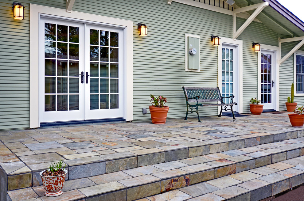 Example of an arts and crafts exterior home design in Other