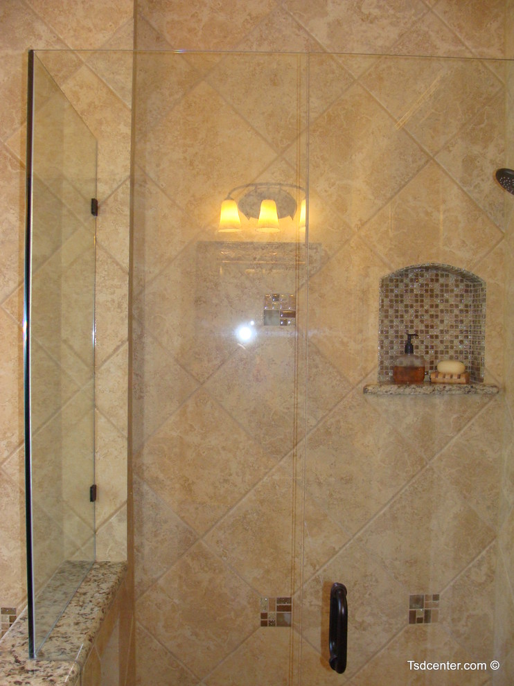 This is an example of a large traditional master bathroom in Other with an undermount sink, raised-panel cabinets, white cabinets, granite benchtops, a drop-in tub, an open shower, multi-coloured tile, porcelain tile and porcelain floors.