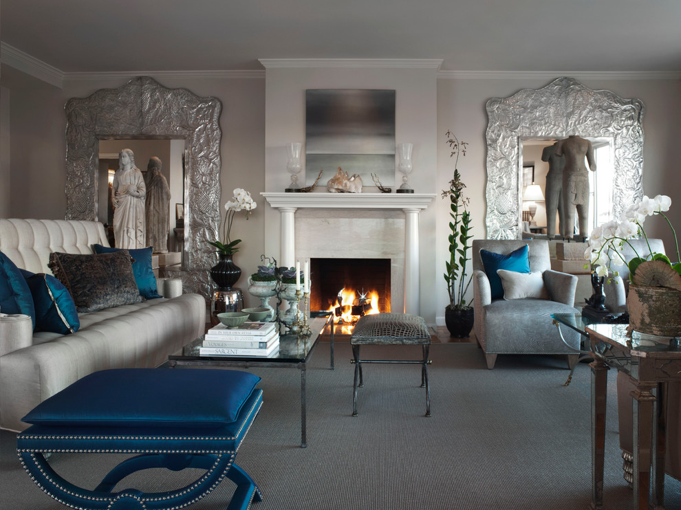 This is an example of an eclectic family room in San Francisco with beige walls, a standard fireplace and no tv.