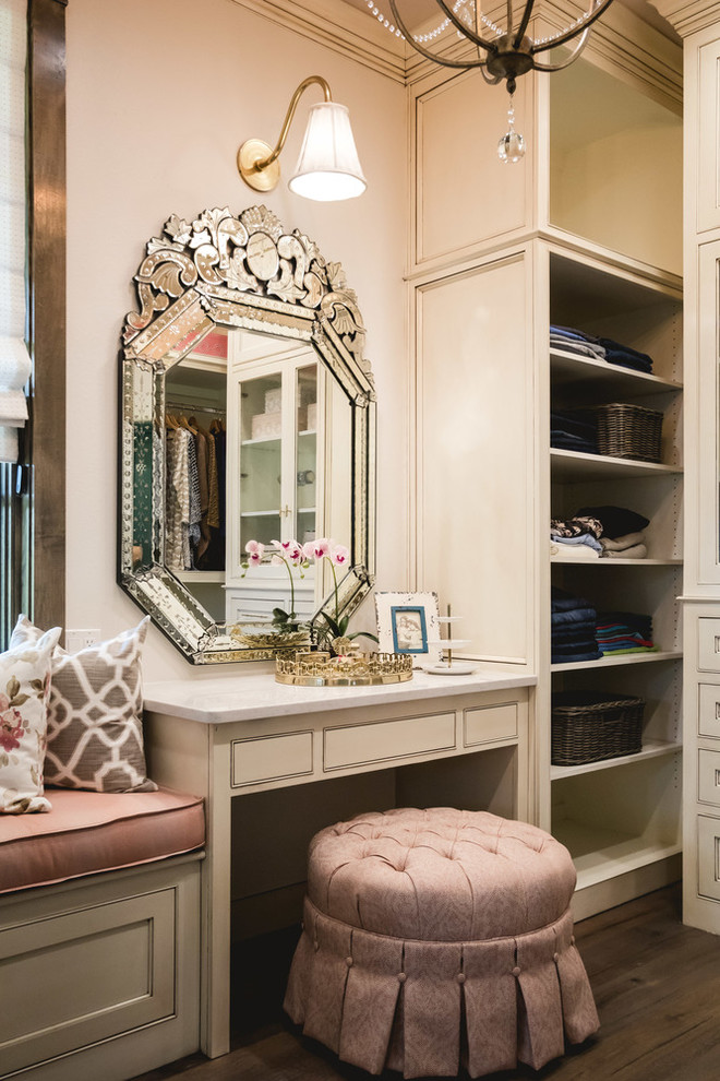 Traditional women's dressing room in Oklahoma City with beaded inset cabinets, beige cabinets and dark hardwood floors.