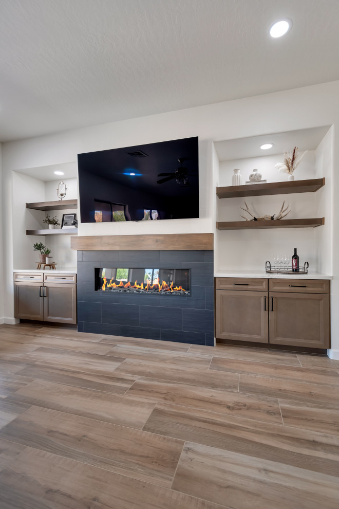Example of a mid-sized transitional u-shaped ceramic tile and brown floor eat-in kitchen design in Phoenix with beaded inset cabinets, brown cabinets, quartzite countertops, white backsplash, ceramic backsplash, an island and white countertops