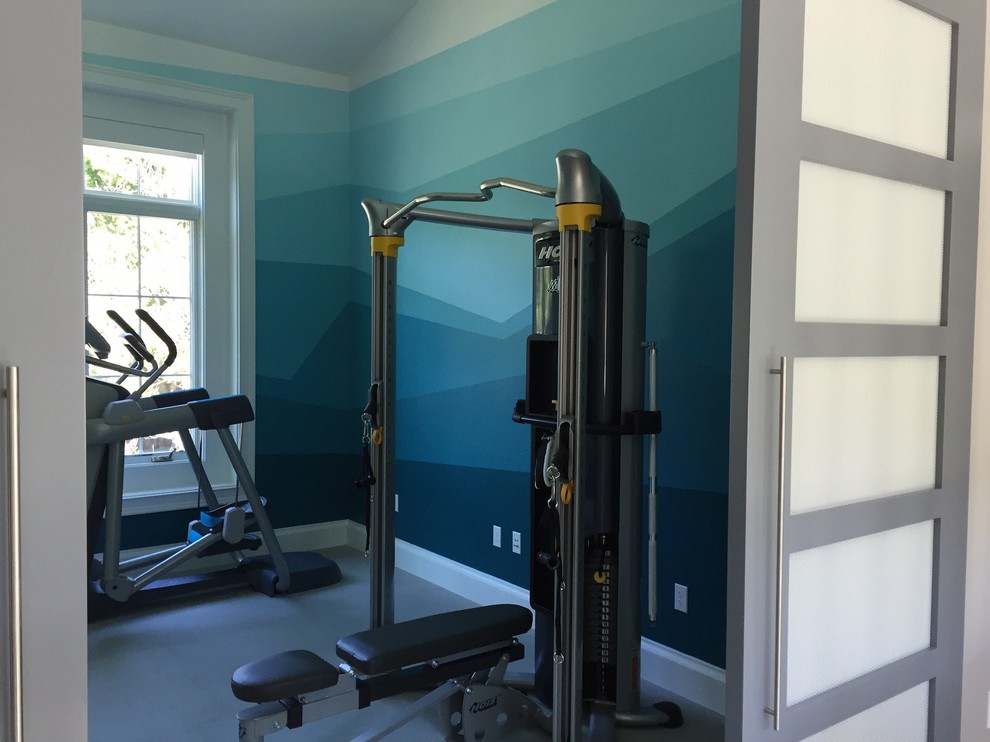 Inspiration for an industrial home gym in San Francisco with grey floor.