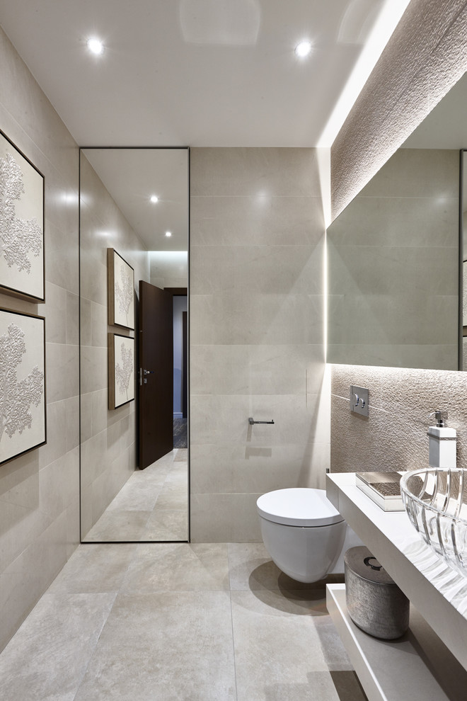 Photo of a contemporary powder room in Moscow with grey floor.