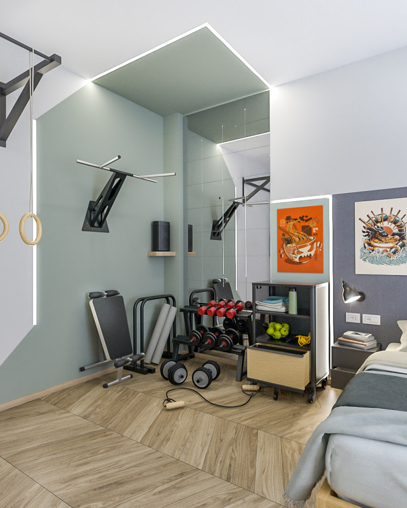 Small industrial multipurpose gym in Milan with multi-coloured walls, light hardwood floors and recessed.