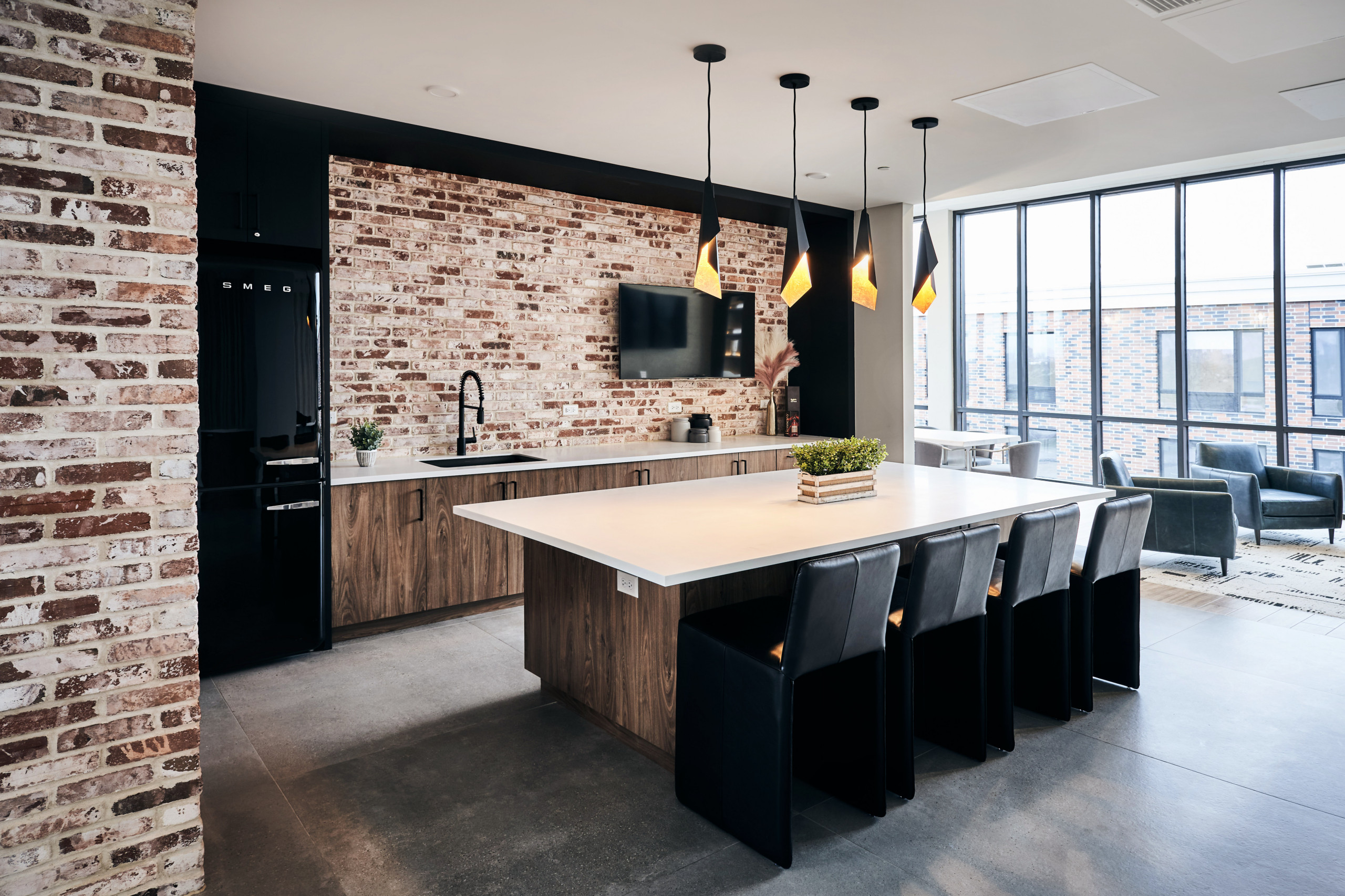 Inspiration for a large contemporary single-wall porcelain tile and gray floor eat-in kitchen remodel in New York with an undermount sink, flat-panel cabinets, medium tone wood cabinets, quartz counte