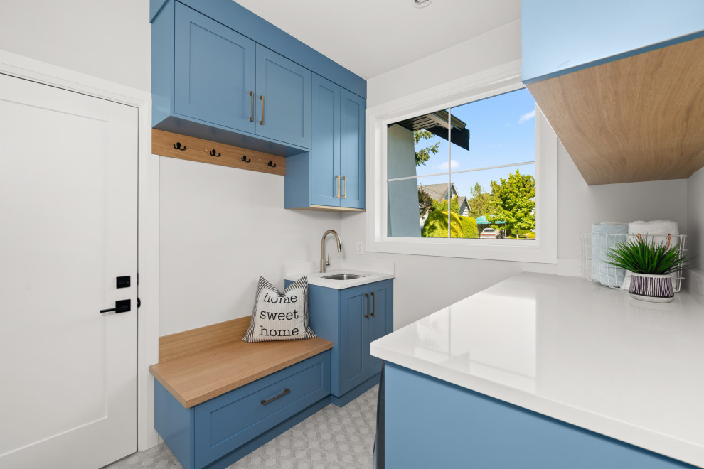 Laundry room - transitional laundry room idea in Vancouver