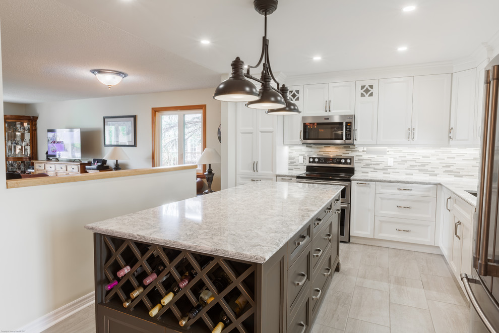 Example of a transitional kitchen design in Toronto