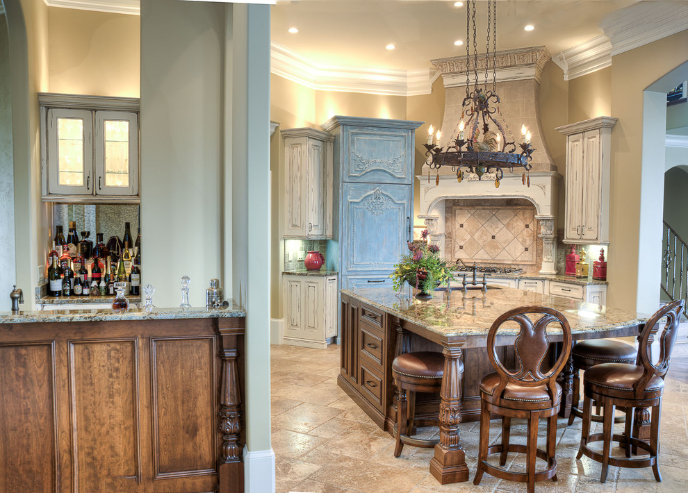 Inspiration for a traditional kitchen in Atlanta with raised-panel cabinets, distressed cabinets and beige splashback.