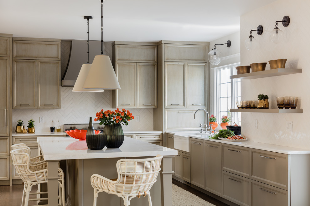 Inspiration for a transitional kitchen in Boston with a farmhouse sink, recessed-panel cabinets, grey cabinets, white splashback and with island.