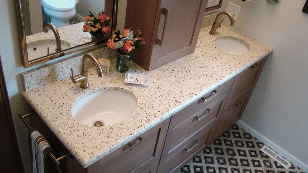 Example of a transitional home design design in Denver