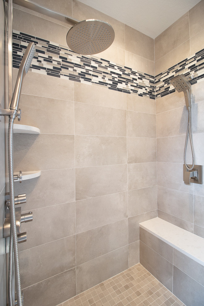 Photo of a large modern ensuite bathroom in Cleveland with glass-front cabinets, brown cabinets, a corner shower, a one-piece toilet, grey tiles, porcelain tiles, grey walls, lino flooring, marble worktops, beige floors, a hinged door, white worktops, a shower bench, double sinks, a built in vanity unit, all types of ceiling and all types of wall treatment.