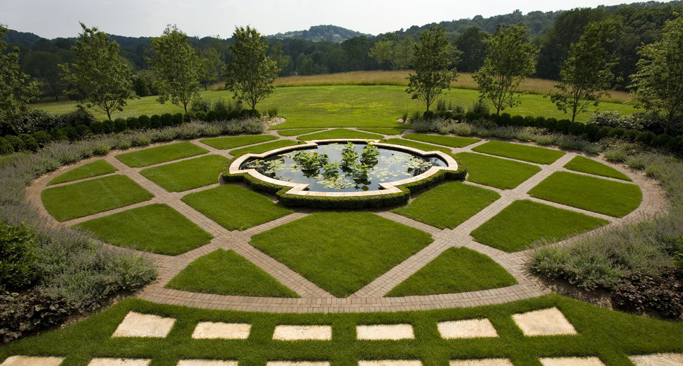 This is an example of an expansive mediterranean formal garden in New York.