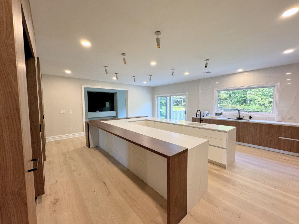 Modern Kitchen with Waterfall Quartz Island