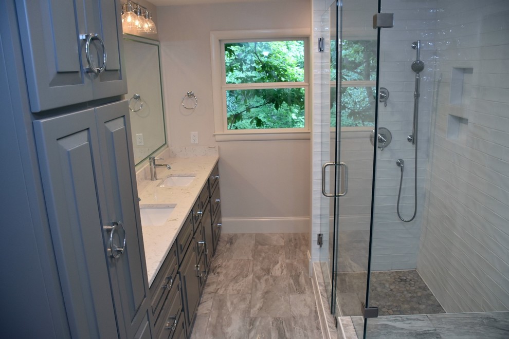 Design ideas for a mid-sized transitional master bathroom in Other with raised-panel cabinets, grey cabinets, an alcove shower, a two-piece toilet, white tile, subway tile, white walls, ceramic floors, an undermount sink, quartzite benchtops, green floor and a hinged shower door.