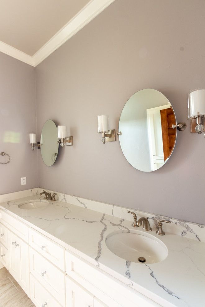 Inspiration for a small transitional kids bathroom in Milwaukee with recessed-panel cabinets, white cabinets, a two-piece toilet, grey walls, ceramic floors, an undermount sink, engineered quartz benchtops, grey floor, white benchtops, a double vanity and a built-in vanity.