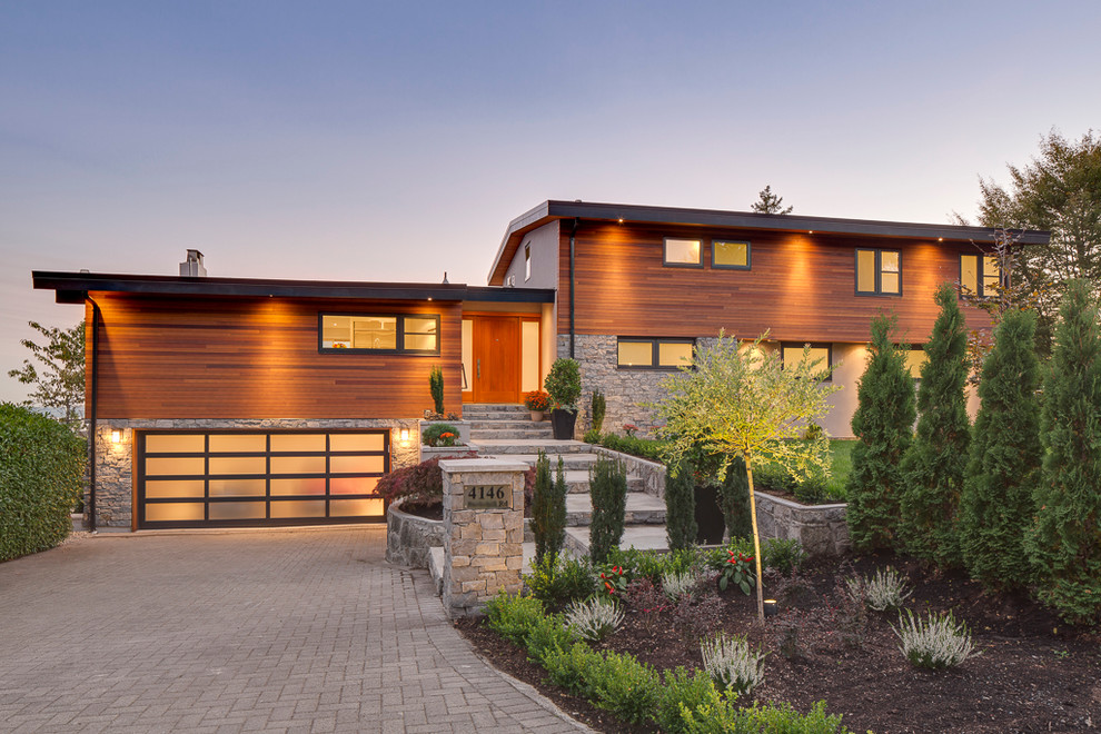 Modern exterior in Vancouver with stone veneer.