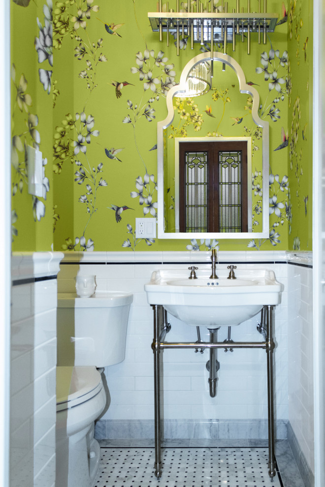 Photo of a medium sized traditional cloakroom in New York with white cabinets, a two-piece toilet, white tiles, metro tiles, green walls, mosaic tile flooring, a console sink, white floors, white worktops, a freestanding vanity unit and wallpapered walls.