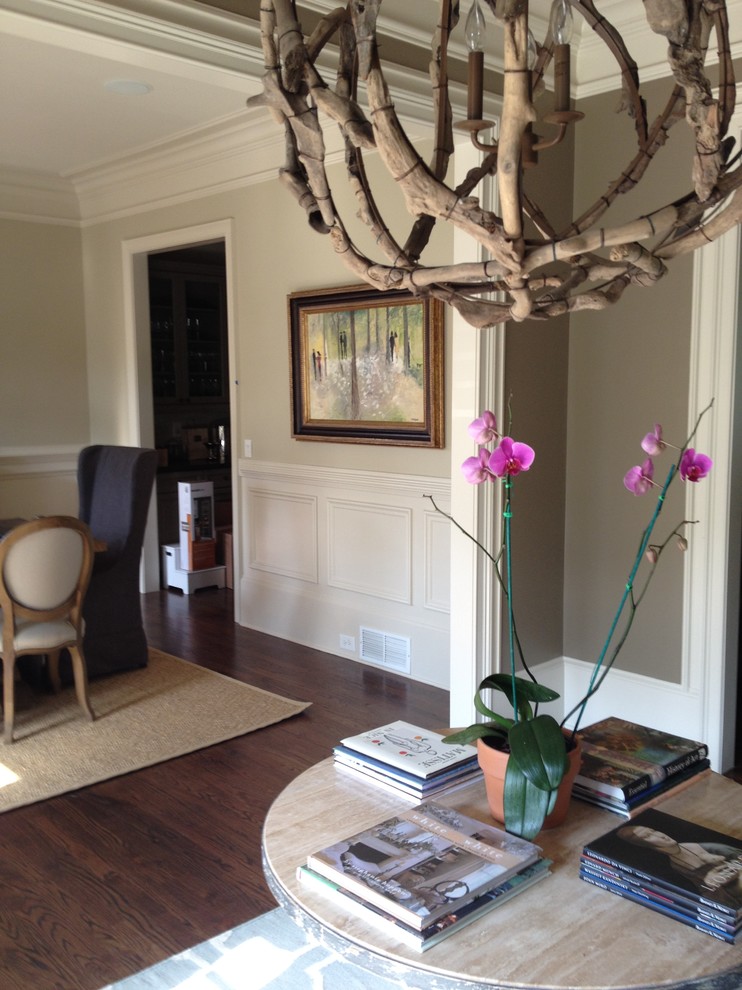 Inspiration for a mid-sized transitional foyer in Atlanta with brown walls, dark hardwood floors and brown floor.