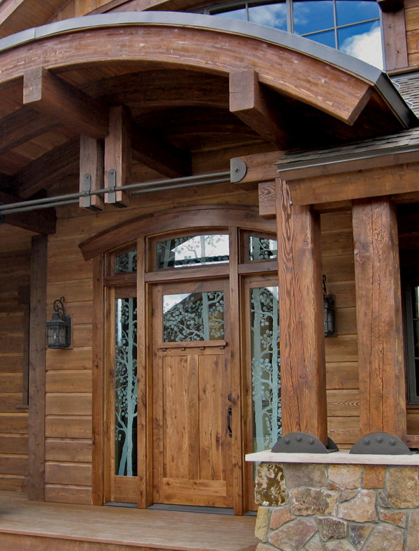 Inspiration for a rustic entryway remodel in Denver