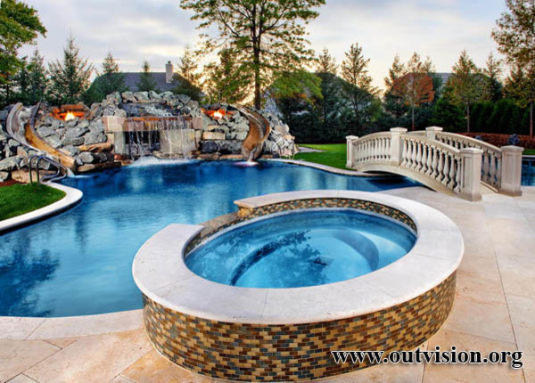 Hot tub - large transitional backyard stone and custom-shaped lap hot tub idea in Chicago