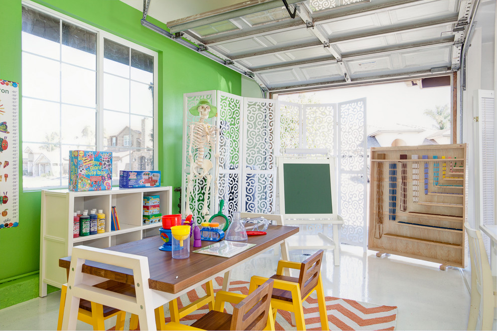 Design ideas for an industrial gender-neutral kids' playroom in San Diego with green walls.