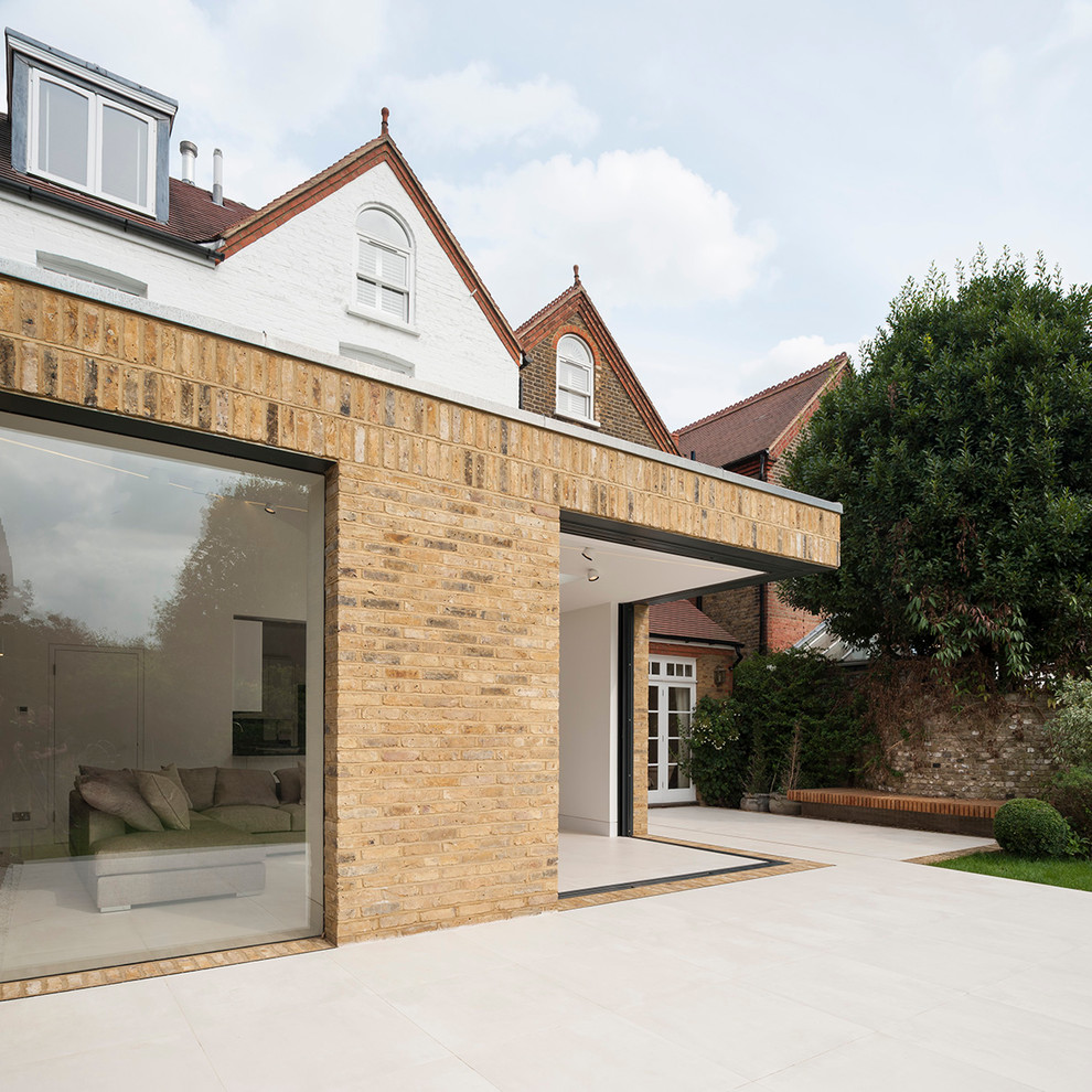 This is an example of a contemporary one-storey brick exterior in London.