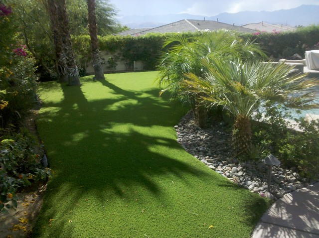 Lawn and Landscape contemporary-garden