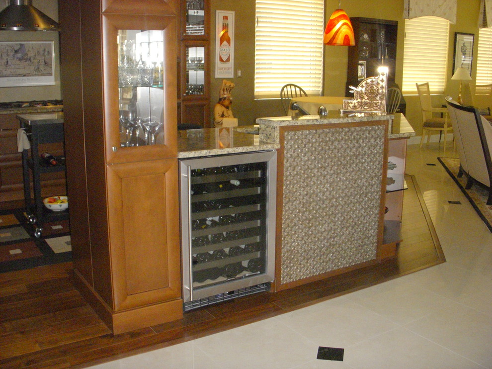 Photo of a contemporary home bar in Tampa.
