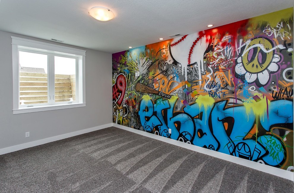 This is an example of a large traditional kids' room for boys in Other with multi-coloured walls, carpet and grey floor.