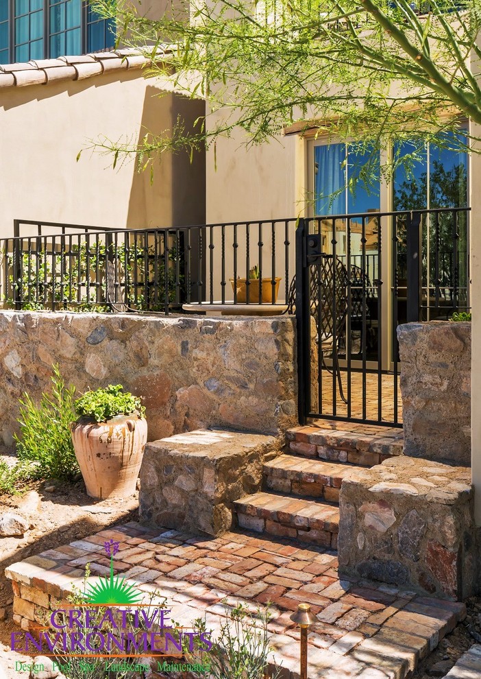 Inspiration for a mid-sized rustic backyard decomposed granite and rectangular pool fountain remodel in Phoenix