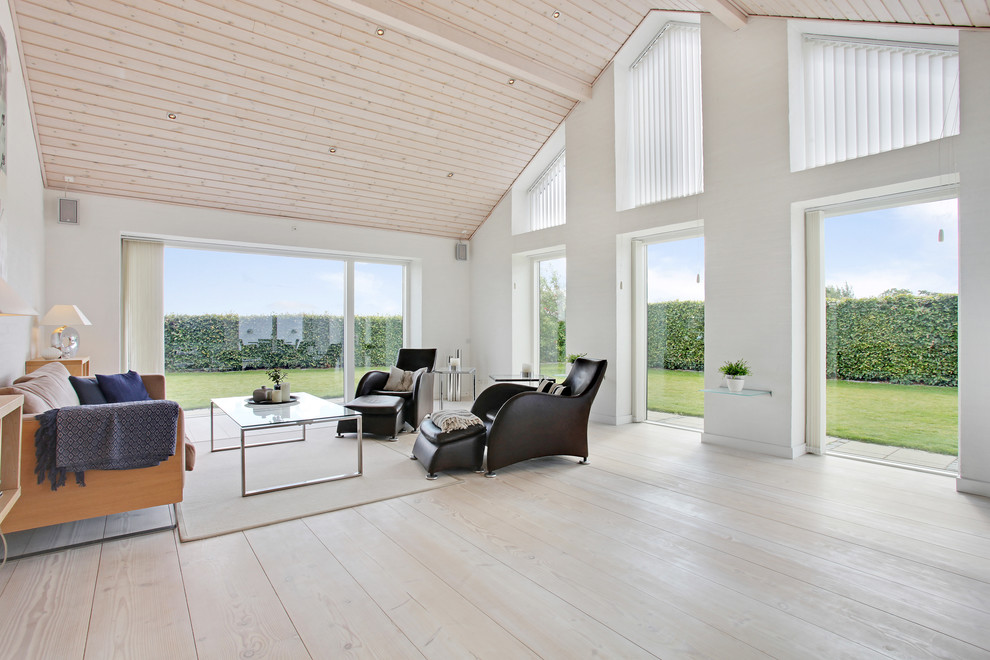 Modern living room in Copenhagen with white walls.