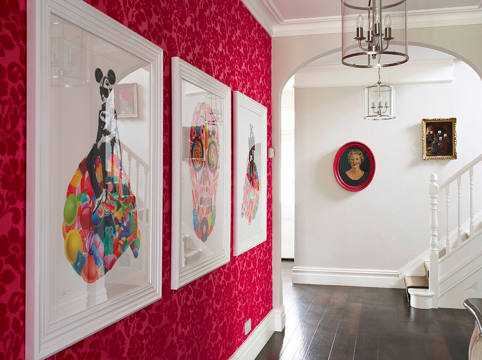Design ideas for an eclectic hallway in Berkshire with red walls and dark hardwood floors.