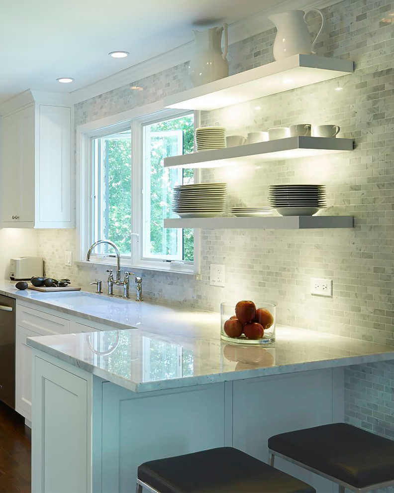Mid-sized modern galley eat-in kitchen in Chicago with an undermount sink, recessed-panel cabinets, white cabinets, quartzite benchtops, multi-coloured splashback, stone tile splashback, stainless steel appliances, dark hardwood floors and a peninsula.