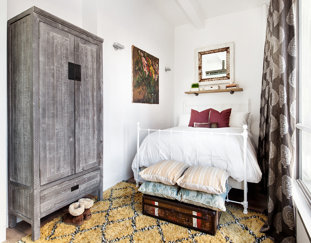 Example of a small country guest bedroom design in Seattle with no fireplace