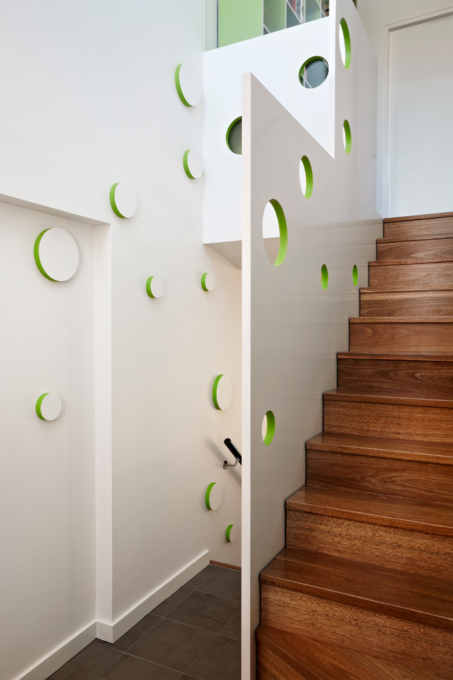 Photo of a contemporary wood straight staircase in Melbourne with wood risers.