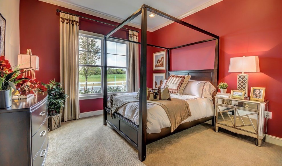 Photo of a mid-sized traditional guest bedroom in New York with red walls and carpet.