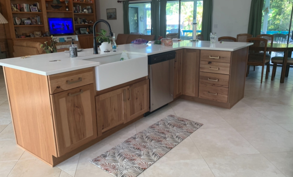 Eat-in kitchen - transitional eat-in kitchen idea with shaker cabinets, medium tone wood cabinets, quartz countertops, white backsplash, quartz backsplash, stainless steel appliances, an island, white countertops and a farmhouse sink