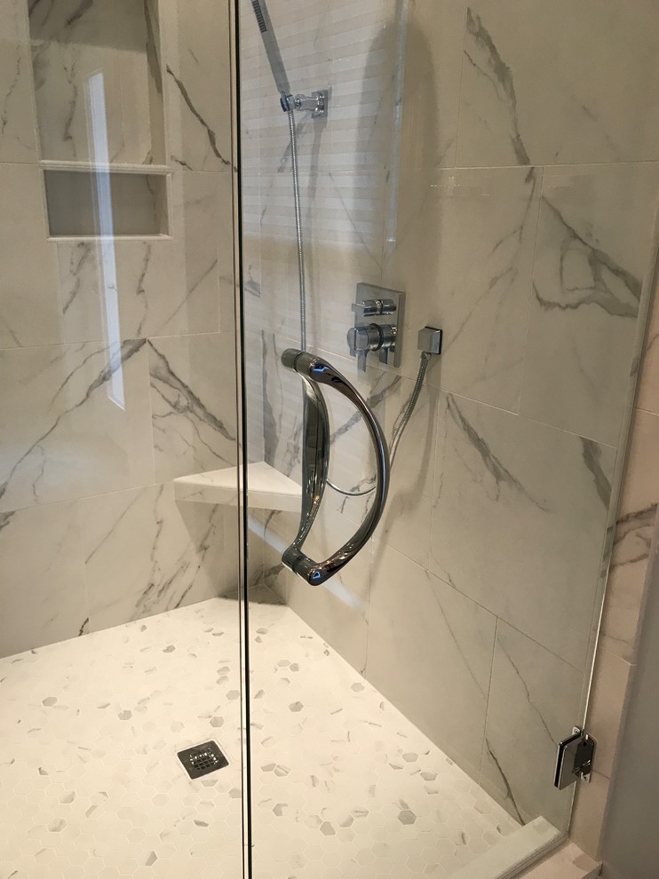 Design ideas for a large transitional master bathroom in Nashville with shaker cabinets, white cabinets, a freestanding tub, an open shower, a two-piece toilet, gray tile, porcelain tile, grey walls, porcelain floors, a drop-in sink, engineered quartz benchtops, grey floor and a hinged shower door.