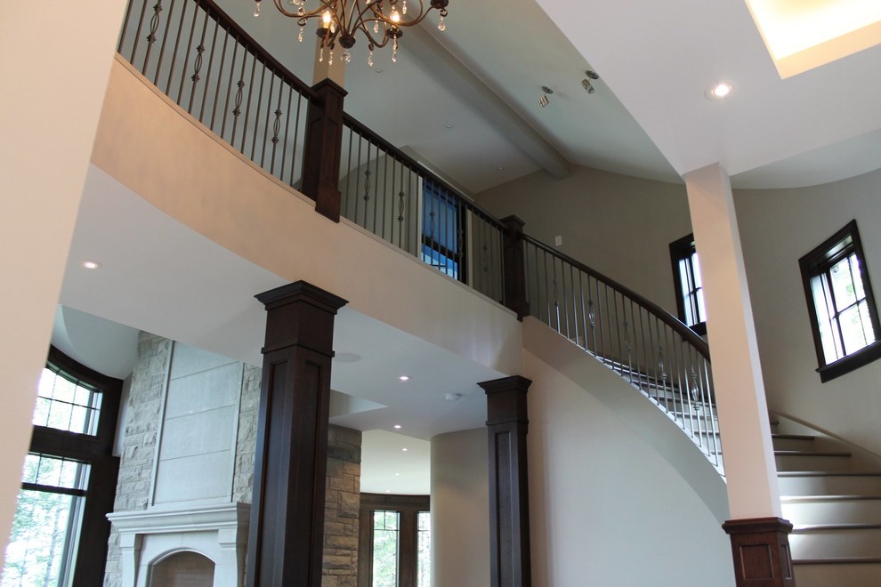 Transitional home design photo in Calgary