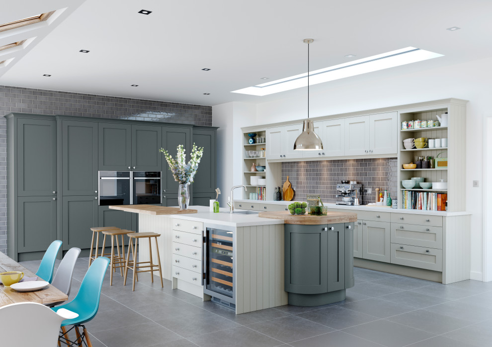 This is an example of a transitional eat-in kitchen in Other with shaker cabinets, beige cabinets, grey splashback, with island and white benchtop.