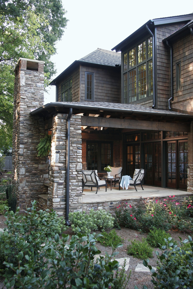 Inspiration for a traditional verandah in Atlanta with a roof extension.